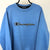 Vintage Champion Spellout Sweatshirt in Baby Blue - Men's Large/Women's XL