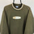 Vintage Reebok Spellout Sweatshirt in Olive Green - Men's Medium/Women's Large