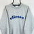 VINTAGE 90S ELLESSE SWEATSHIRT IN GREY & NAVY - MEN'S MEDIUM/WOMEN'S LARGE