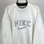 VINTAGE NIKE SPELLOUT SWEATSHIRT IN WHITE - MEN'S LARGE/WOMEN'S XL