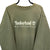 VINTAGE 90S TIMBERLAND SPELLOUT SWEATSHIRT IN LIGHT OLIVE - MEN'S XL/WOMEN'S XXL